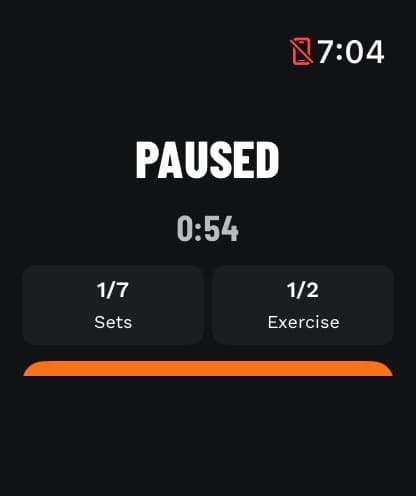 Watch paused screen with elapsed time, sets done and exercise number