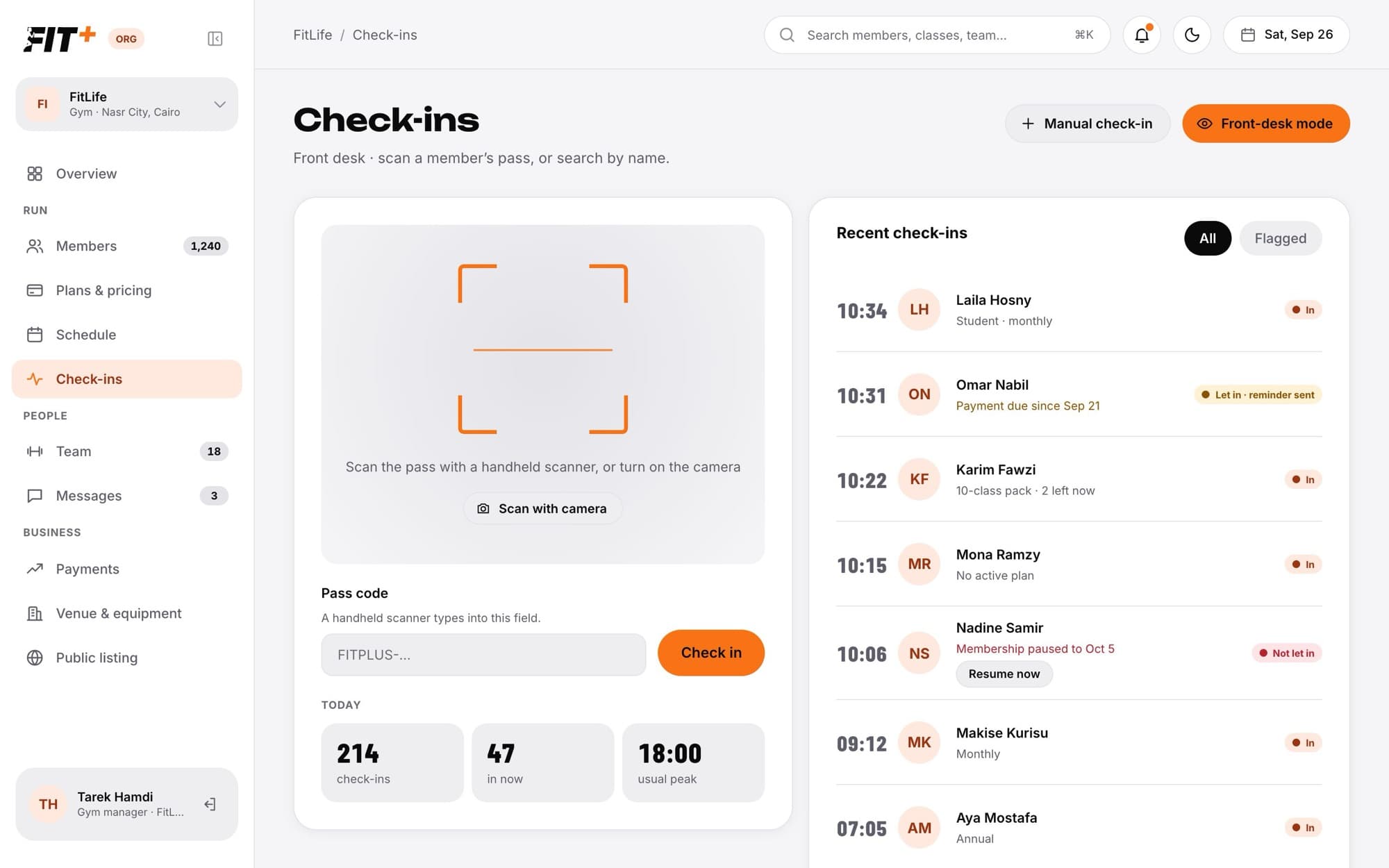 The Check-ins page with a pass scanner, a Pass code field, today's numbers and a list of recent check-ins